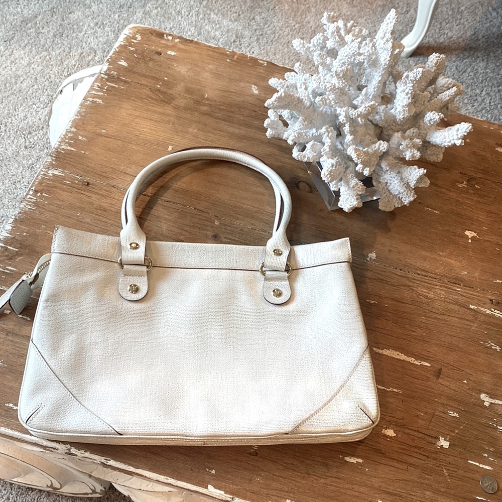Kate spade white (gold shimmer) handbag.